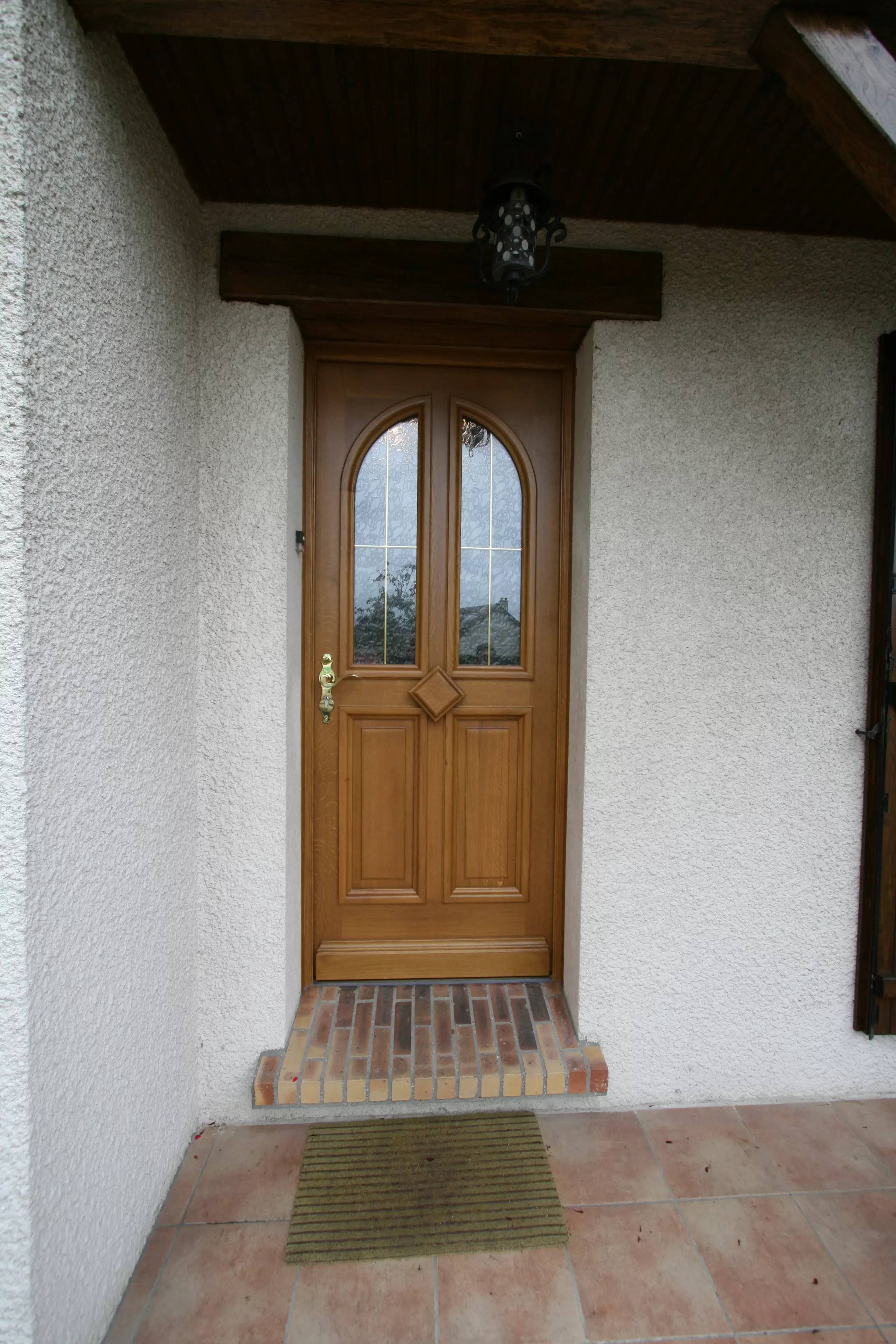 Portes d'entrée en aluminium, bois ou PV